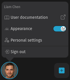 Screenshot shows the avatar menu with the entries User documentation,
Appearance (dark mode toggle), Personal settings and Sign
out